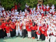 Staf Ahli Bidang Kemasyarakatan dan SDM Kota Metro Hadiri Peringatan HUT SMPN 2 Metro